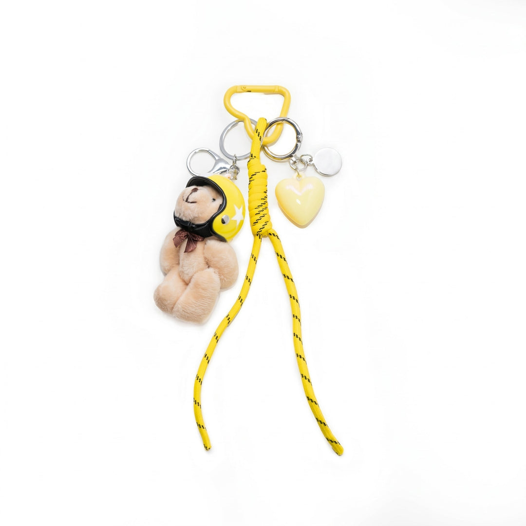Yellow pilot teddy bear bag charm with helmet, cord and heart
