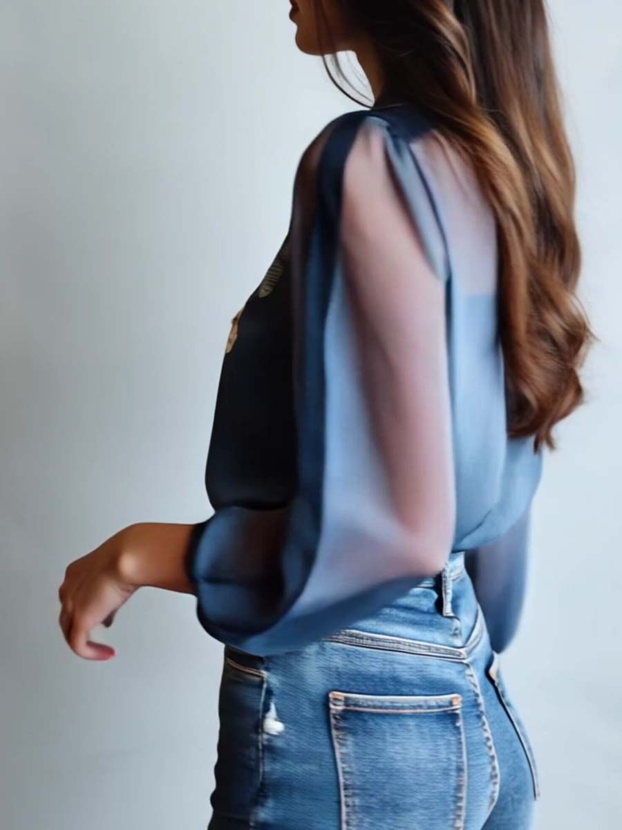 Women's blue floral print sheer button-up blouse side view