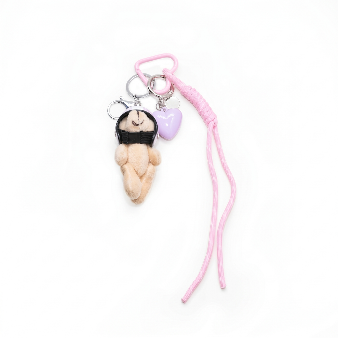 Pink pilot teddy bear bag charm with helmet, cord and heart