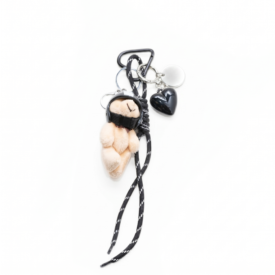 Black pilot teddy bear bag charm with helmet, cord and heart
