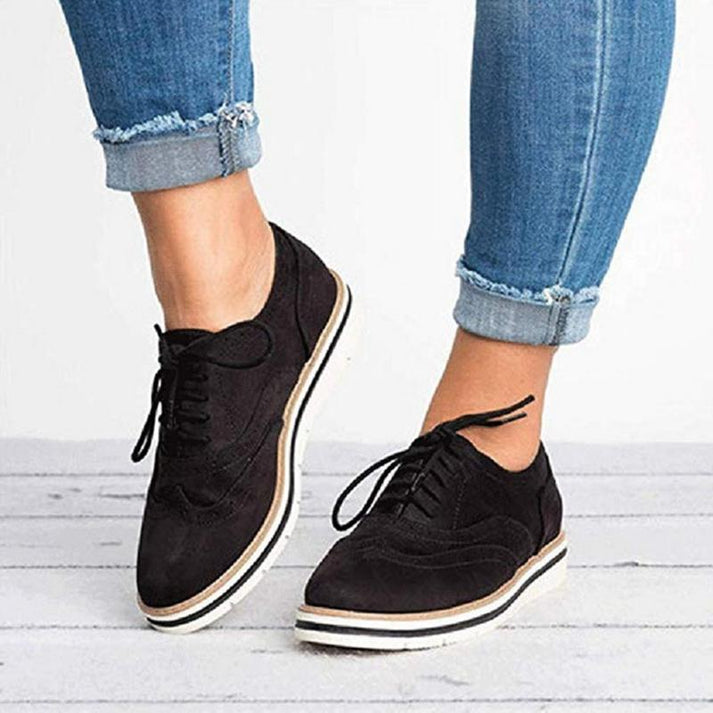 Women's black lace-up brogue platform sneakers